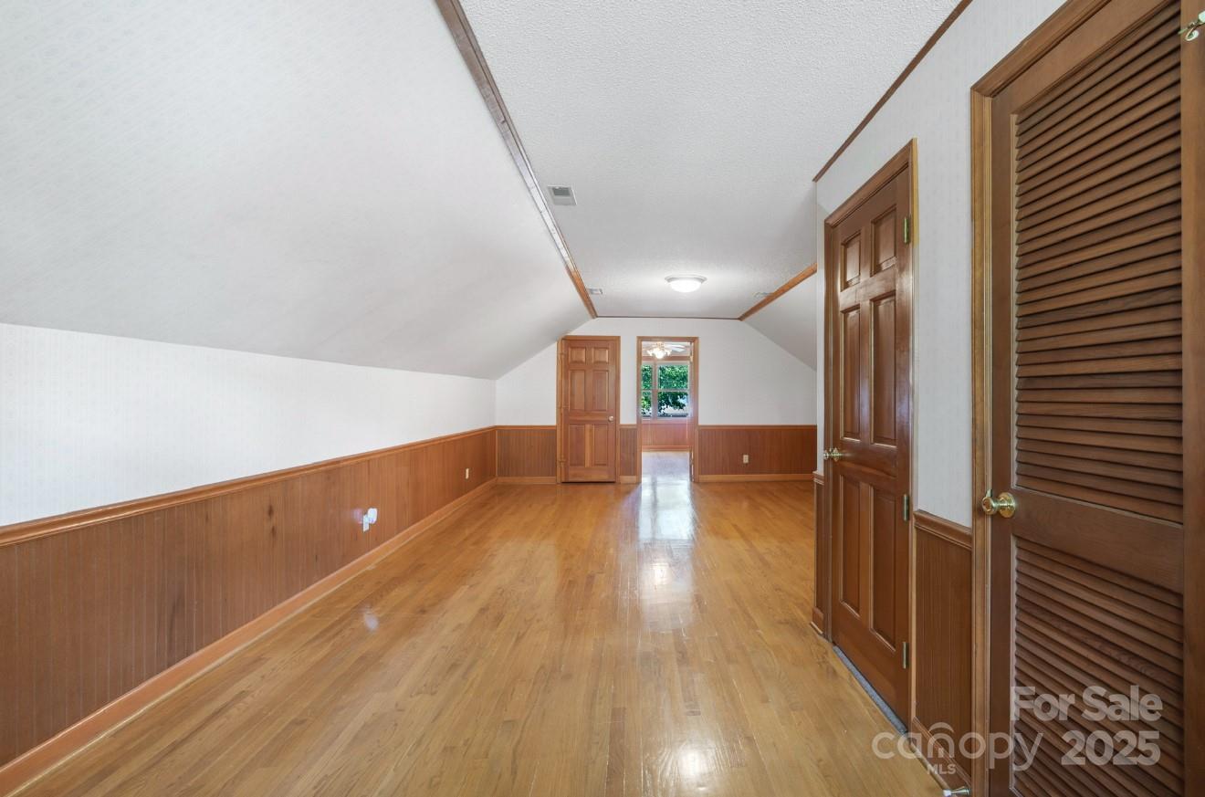 993 Jackson Road Fort Lawn, SC 29714 - Photo 38 of 48 a view of a hallway with wooden floor