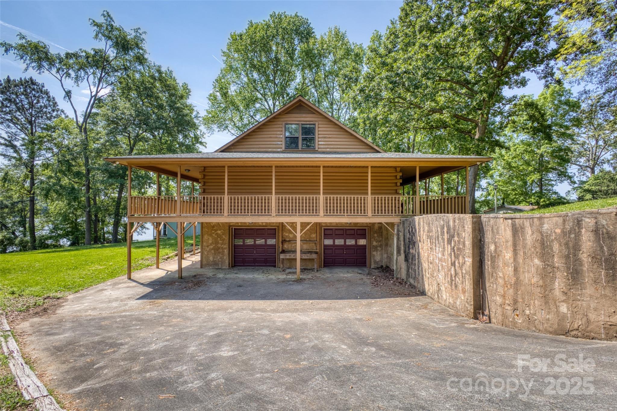 993 Jackson Road Fort Lawn, SC 29714 - Photo 4 of 48 a view of a house with a yard and large trees