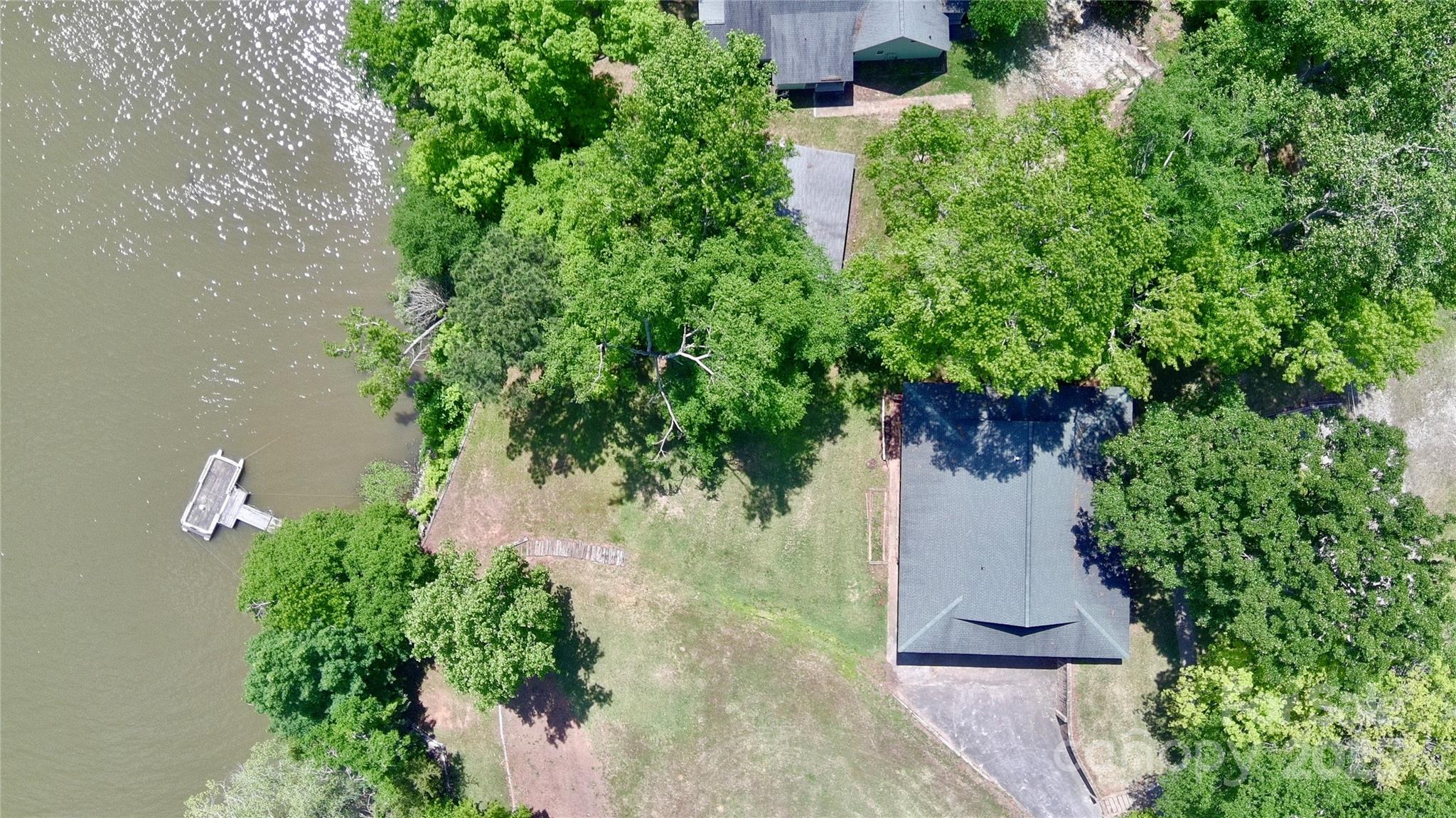 993 Jackson Road Fort Lawn, SC 29714 - Photo 47 of 48 an aerial view of a house with a yard and garden