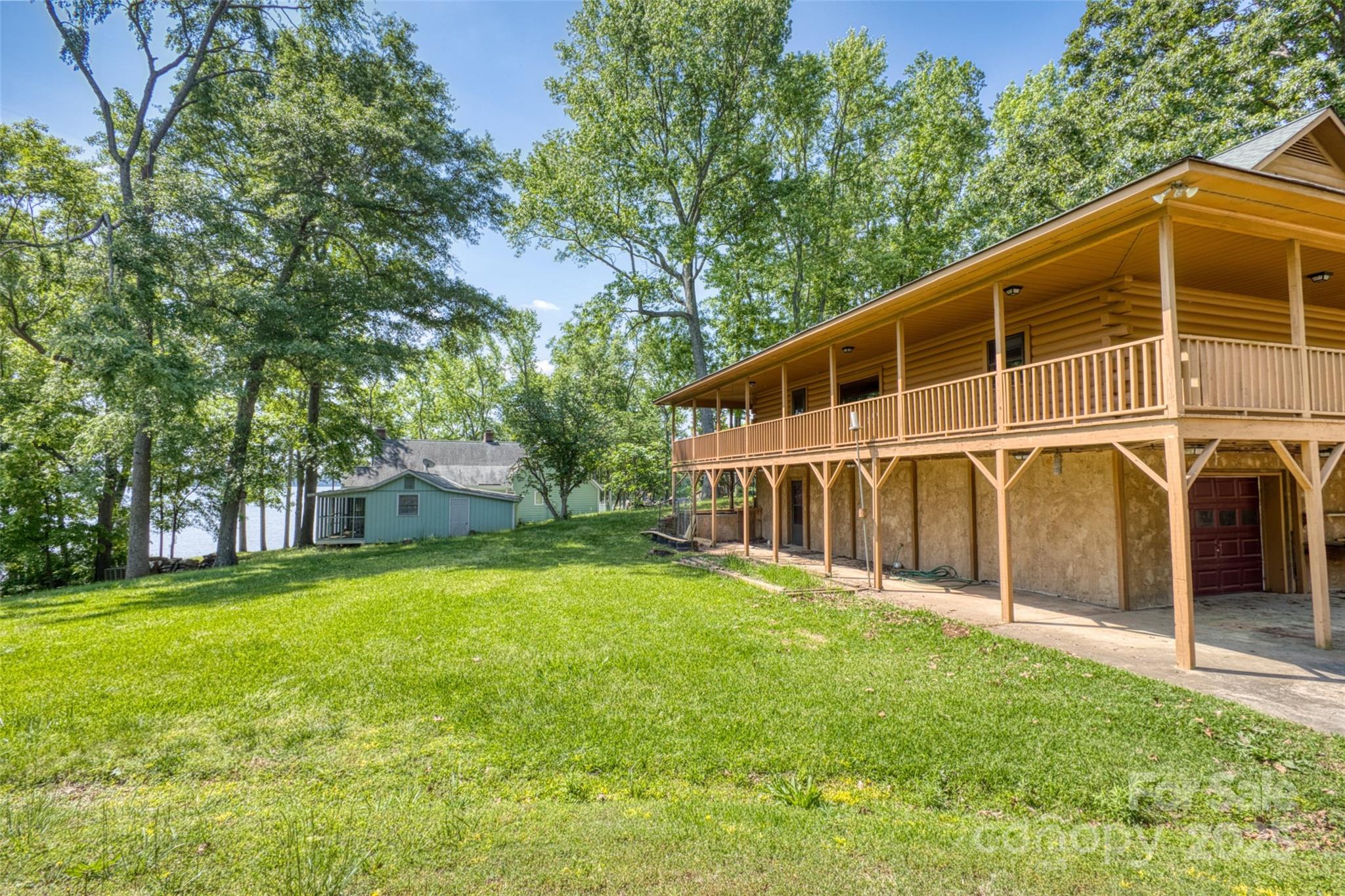 993 Jackson Road Fort Lawn, SC 29714 - Photo 5 of 48 a view of a house with a backyard