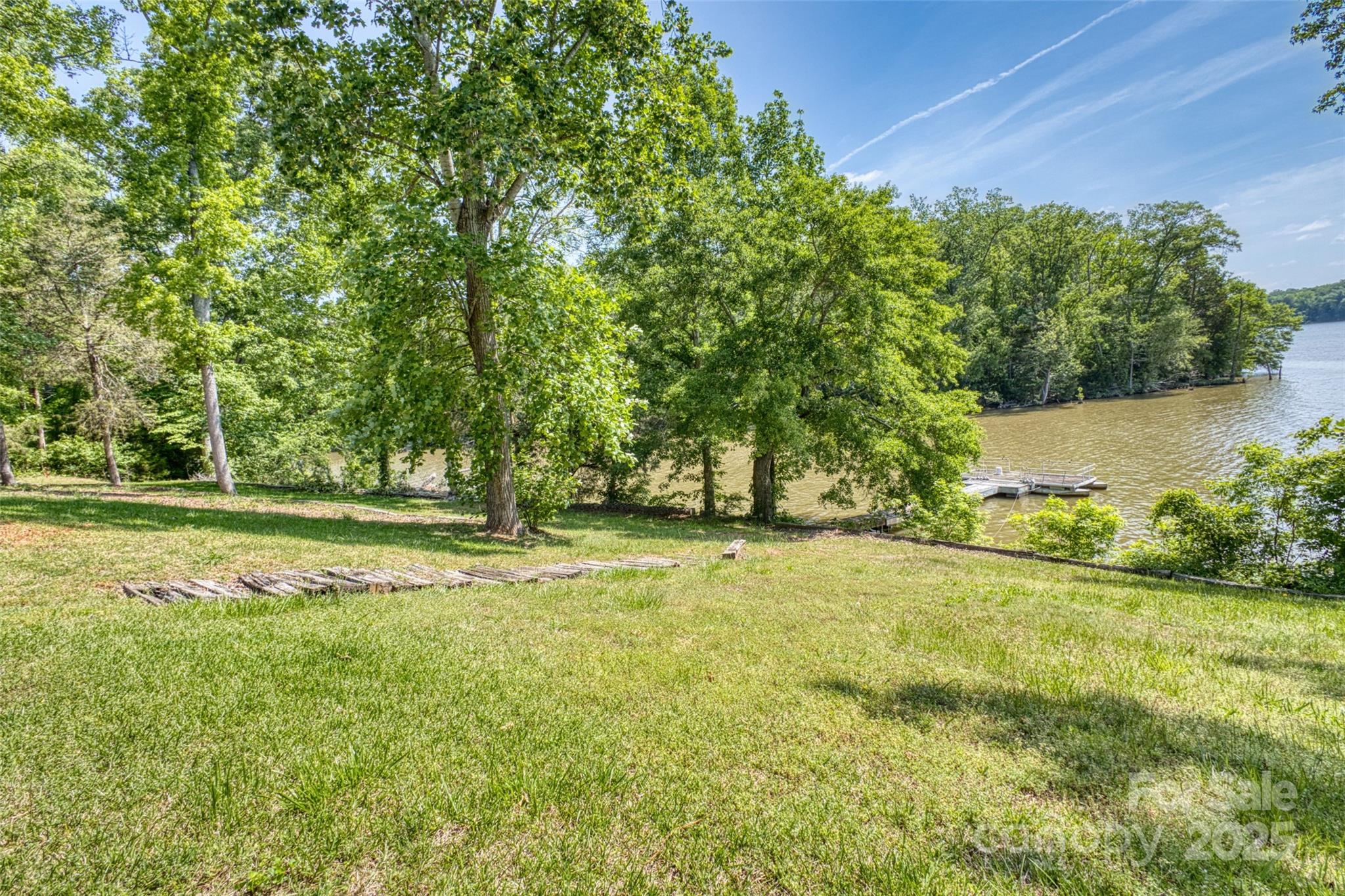993 Jackson Road Fort Lawn, SC 29714 - Photo 7 of 48 a view of a trees and basketball court