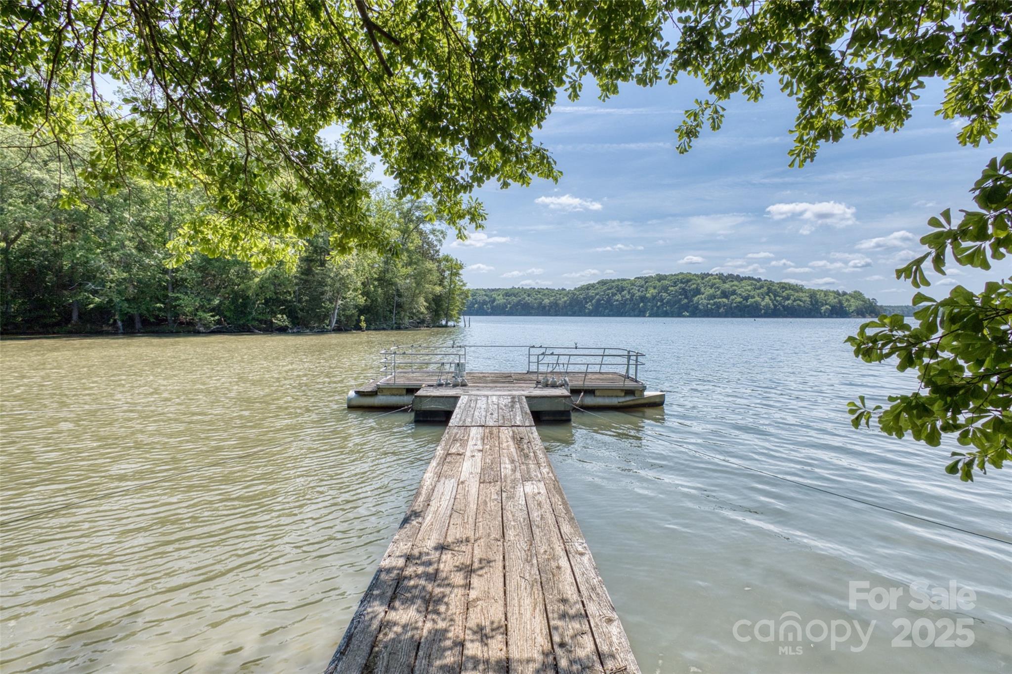 993 Jackson Road Fort Lawn, SC 29714 - Photo 8 of 48 a view of a lake with chairs