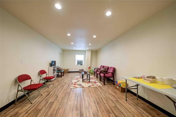 a view of a workspace with furniture