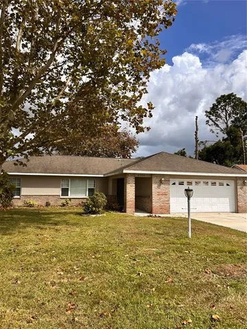 a front view of house with yard