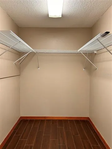 a view of a room with racks on the wall