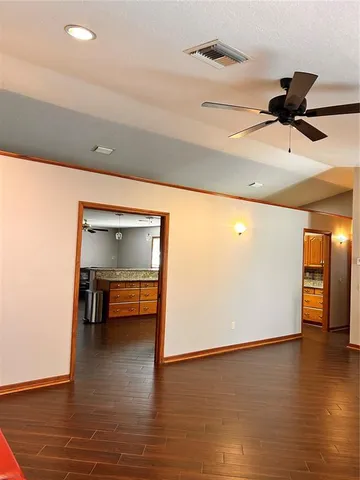 a view of an empty room and window