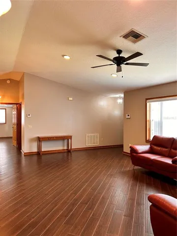 a view of a livingroom with furniture