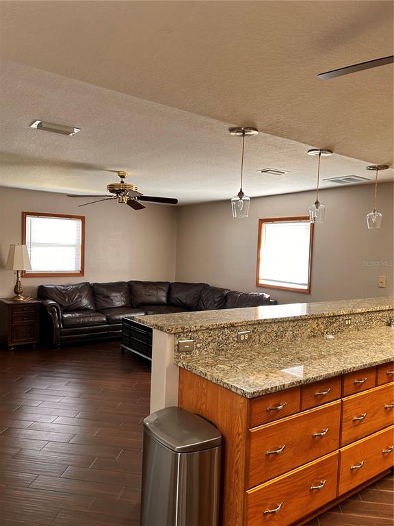 2284 Champlain Avenue Spring Hill, FL 34609 - Photo 9 of 28 a kitchen that has a sink and a stove