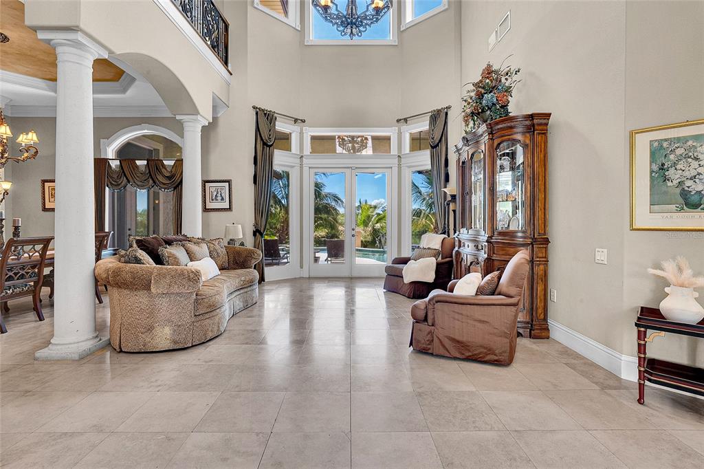 8707 Silverthorn Road Seminole, FL 33777 - Photo 3 of 58 a living room with furniture and a large window