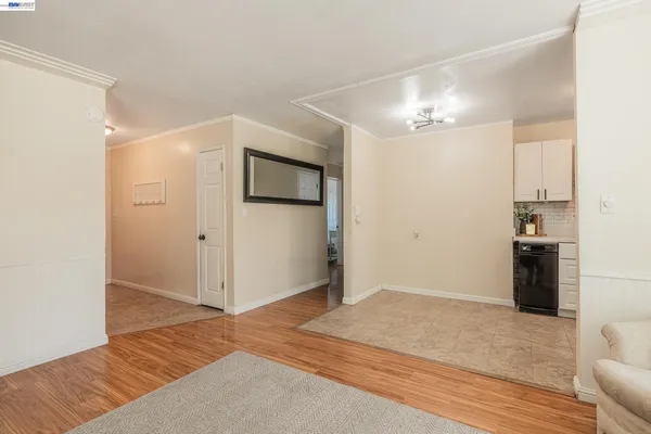 a bedroom with a bed and cabinets