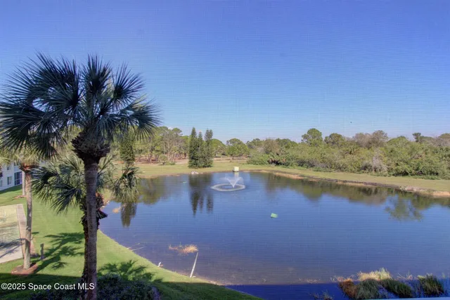 a view of lake with mountain
