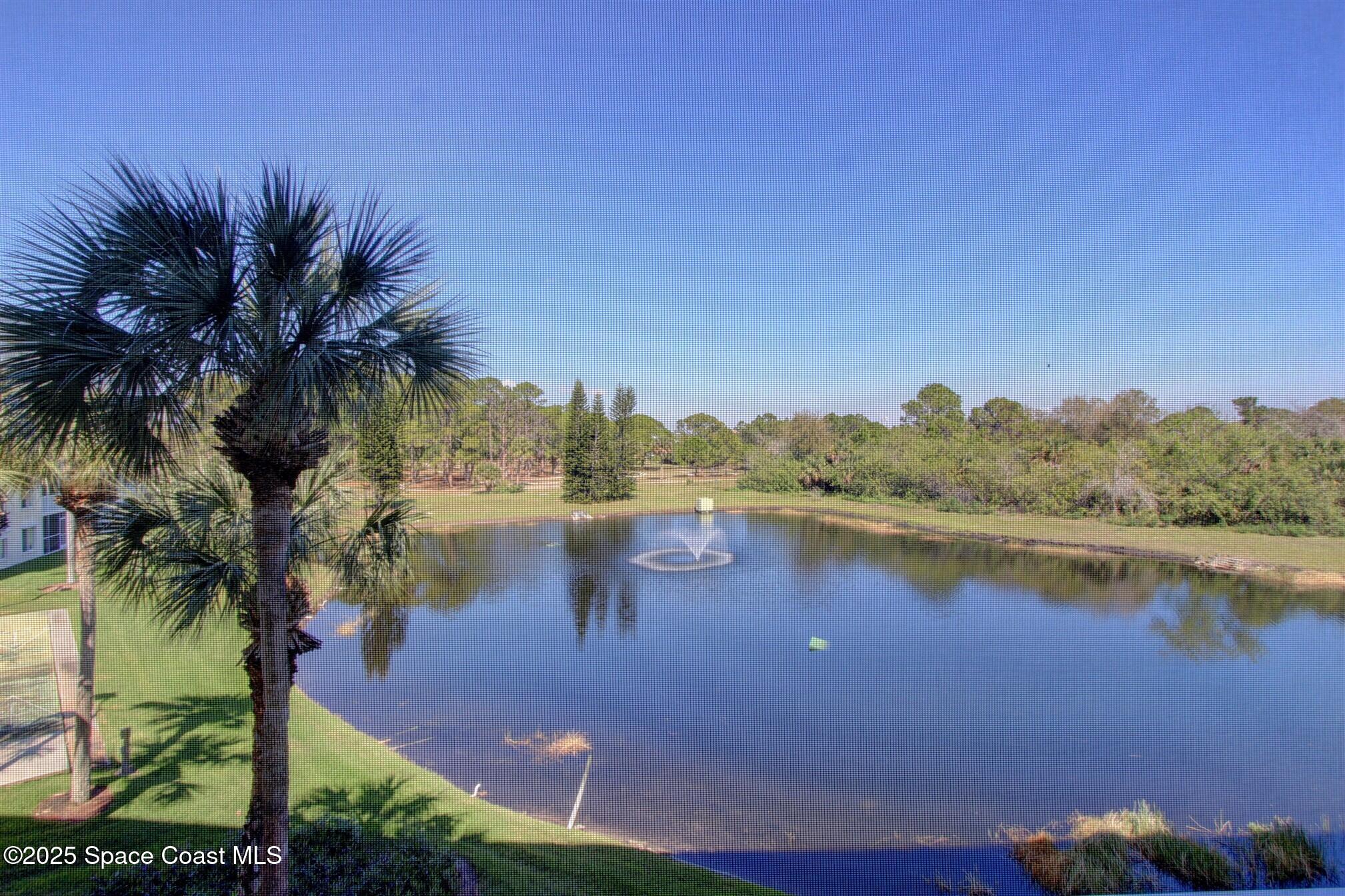 1420 Huntington Lane, Unit 2304 Rockledge, FL 32955 - Photo 13 of 34 a view of lake with mountain
