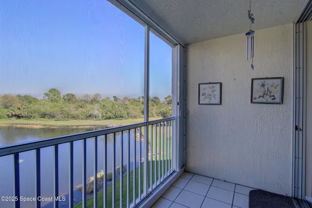 a view of balcony with furniture