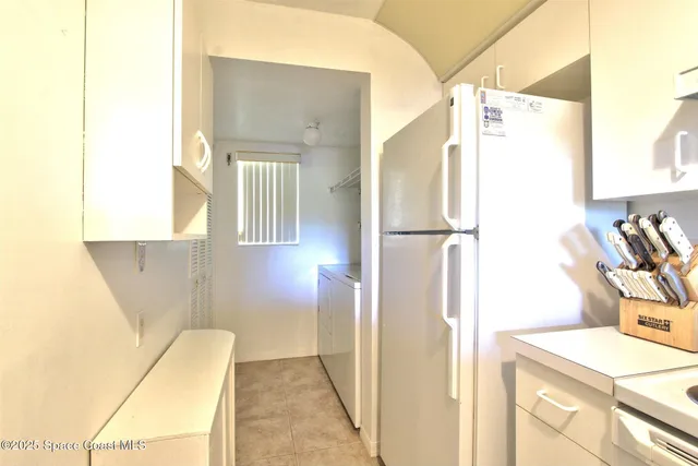 a bathroom with a sink a mirror and a shower