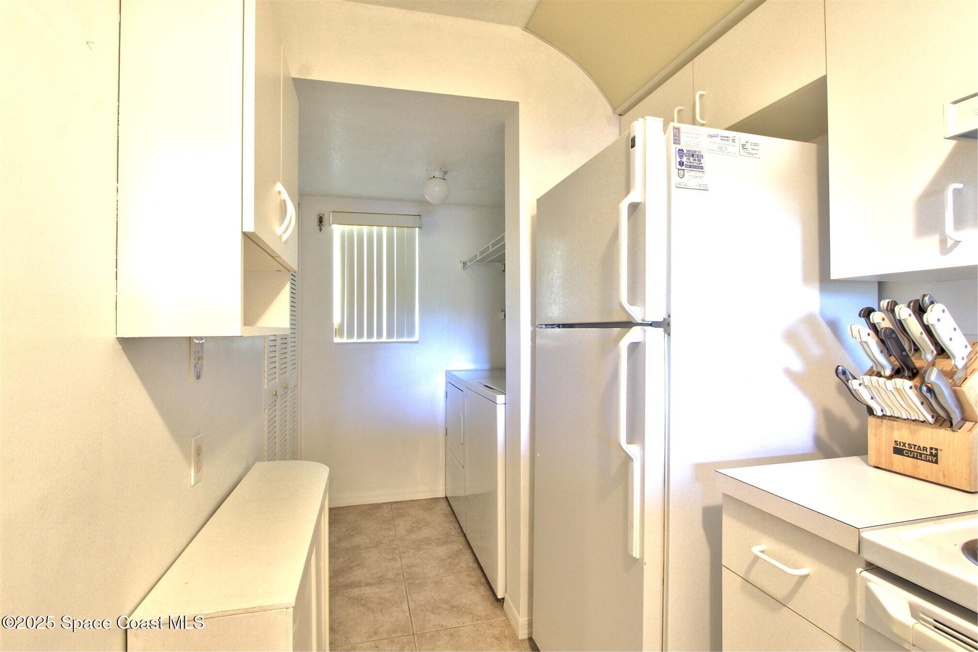 1420 Huntington Lane, Unit 2304 Rockledge, FL 32955 - Photo 20 of 34 a bathroom with a sink and a mirror