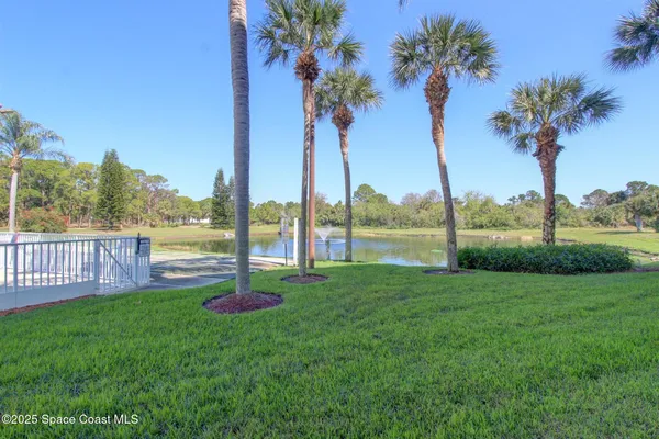 a view of a garden and lake