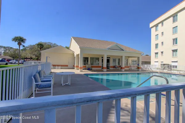 a view of house with outdoor seating space