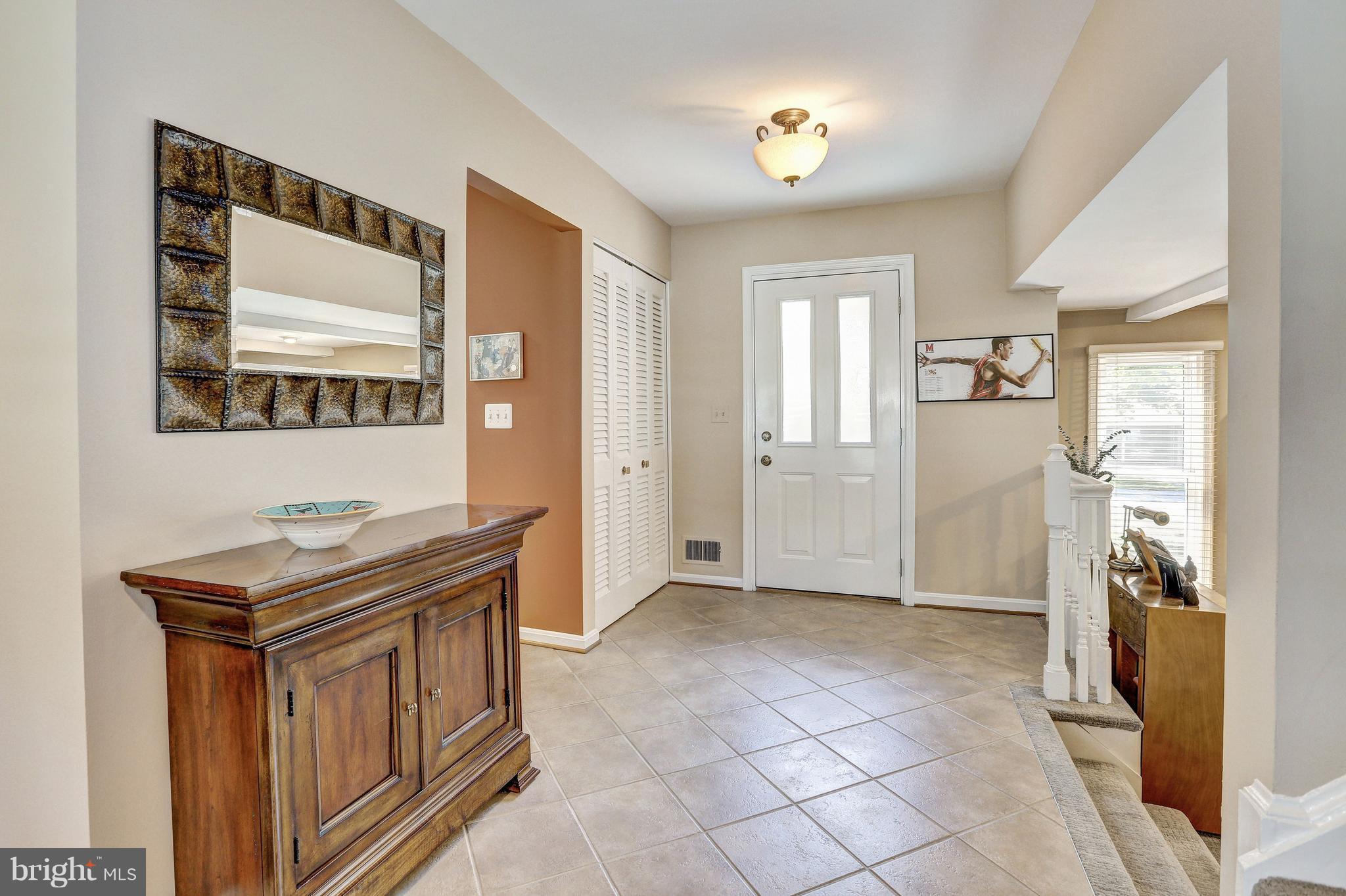 15128 Middlegate Road Silver Spring, MD 20905 - Photo 2 of 30 CERAMIC TILE FOYER, DOOR W/ FROSTED WINDOWS