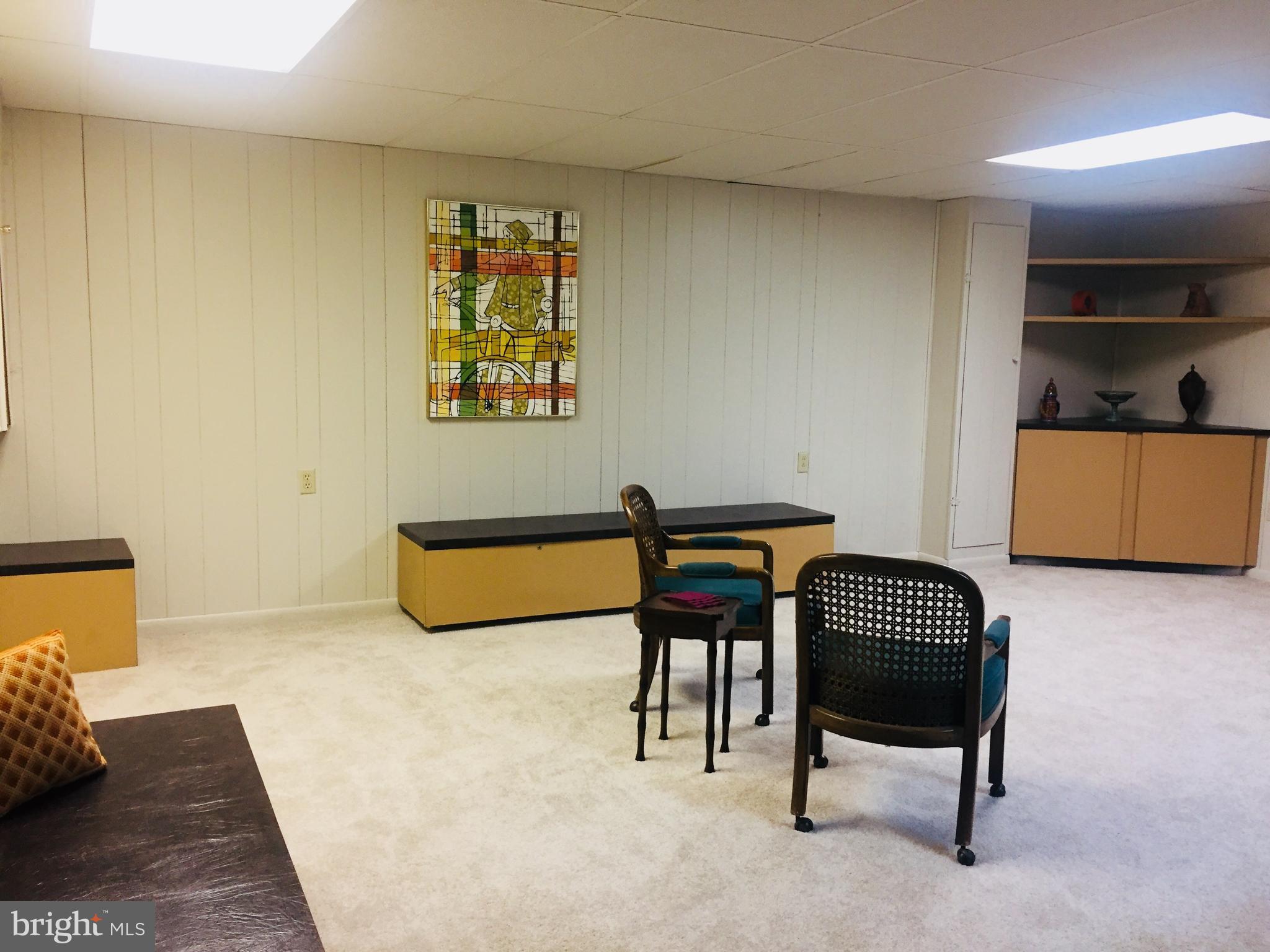 15128 Middlegate Road Silver Spring, MD 20905 - Photo 24 of 30 RM FOR GAME TABLE, ENJOY UNDER-SEAT STORAGE