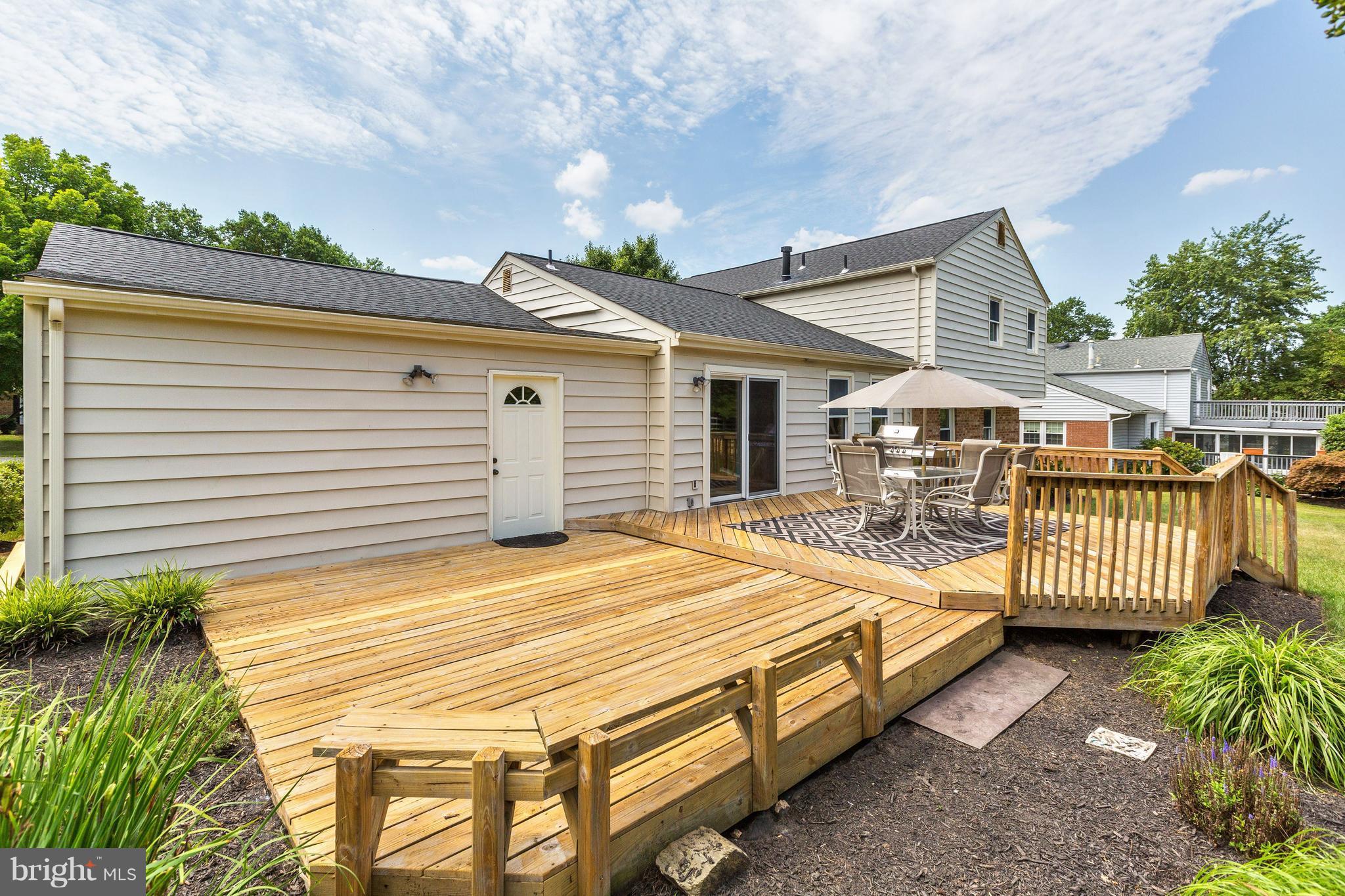 15128 Middlegate Road Silver Spring, MD 20905 - Photo 26 of 30 TWO-LEVEL DECK W/ BENCH SEATING