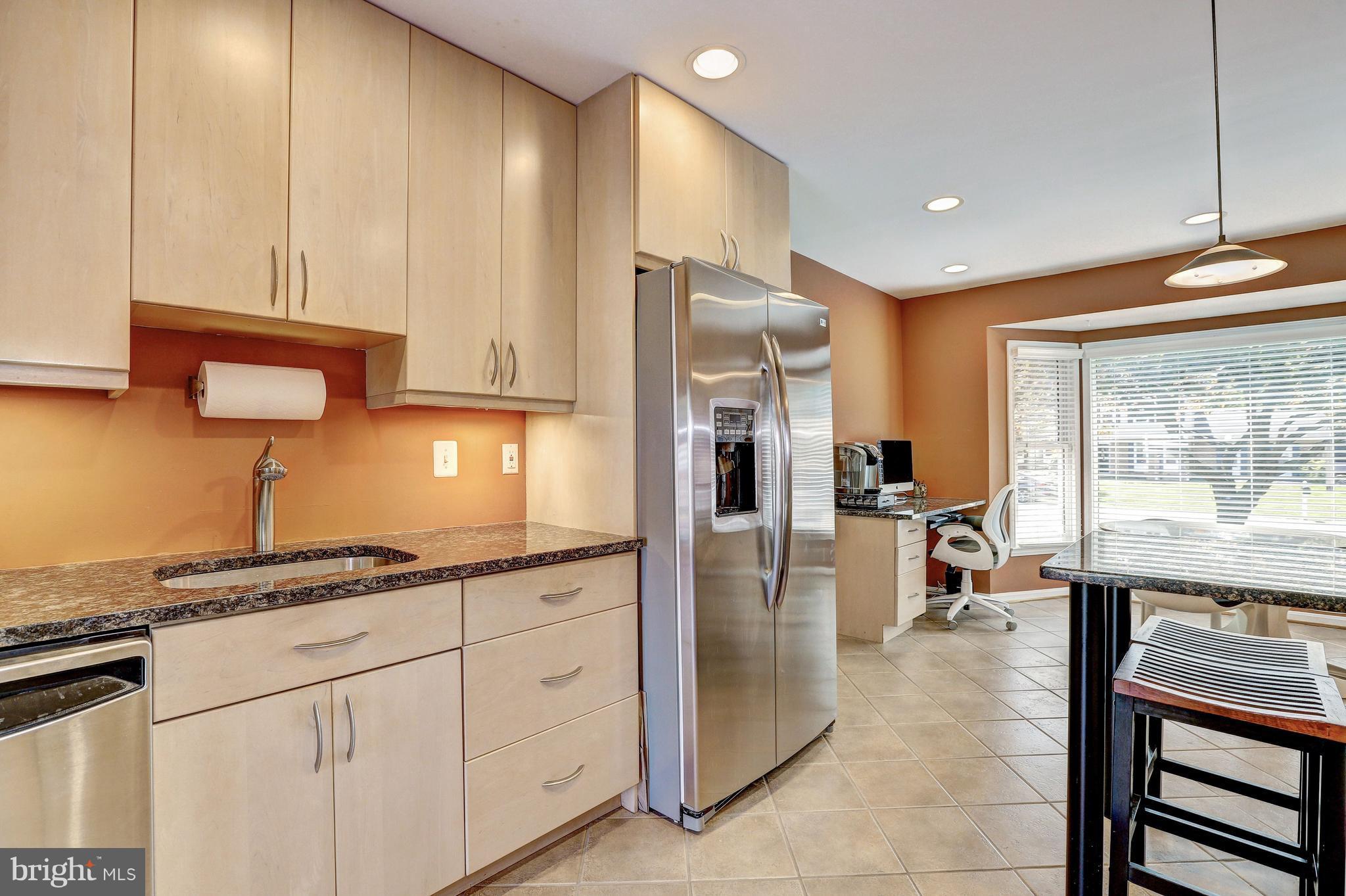 15128 Middlegate Road Silver Spring, MD 20905 - Photo 9 of 30 SLEEK GRANITE COUNTERS