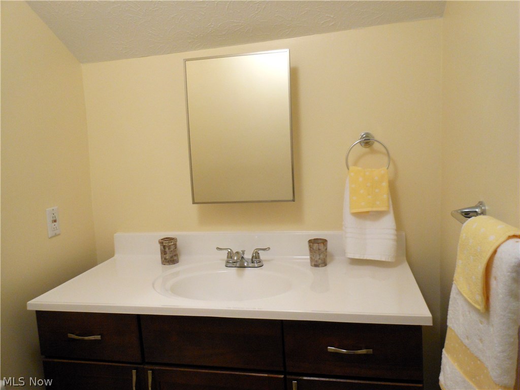 891 Montford Road Cleveland, OH 44121 - Photo 11 of 25 Newer Vanity, Mirror Cabinet, Faucets & paint in this 2nd floor bathroom.