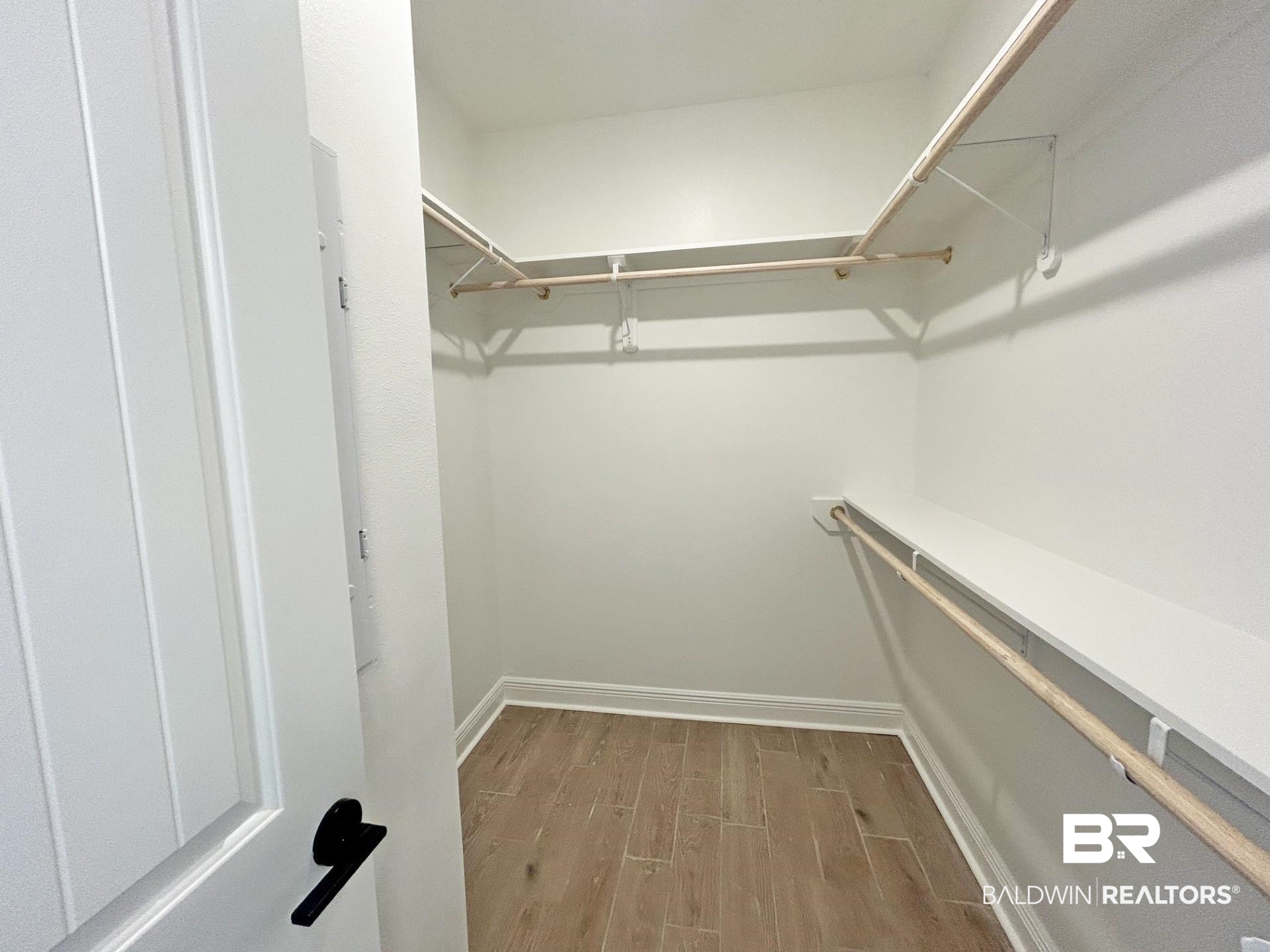 825 Sumter Loop Foley, AL 36535 - Photo 12 of 21 Walk in closet featuring wood finish floors