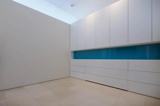 a view of cabinets and workspace