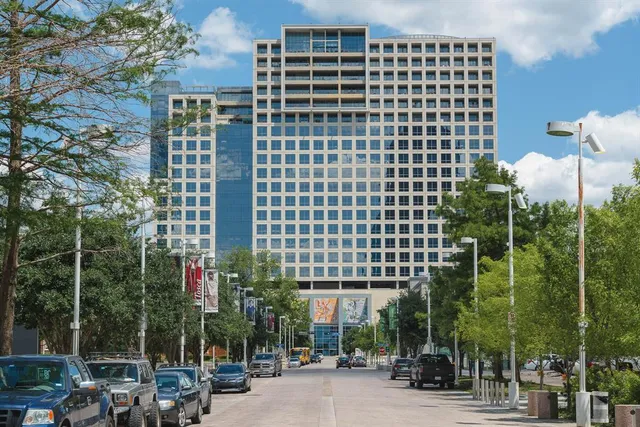 a view of a city with tall buildings