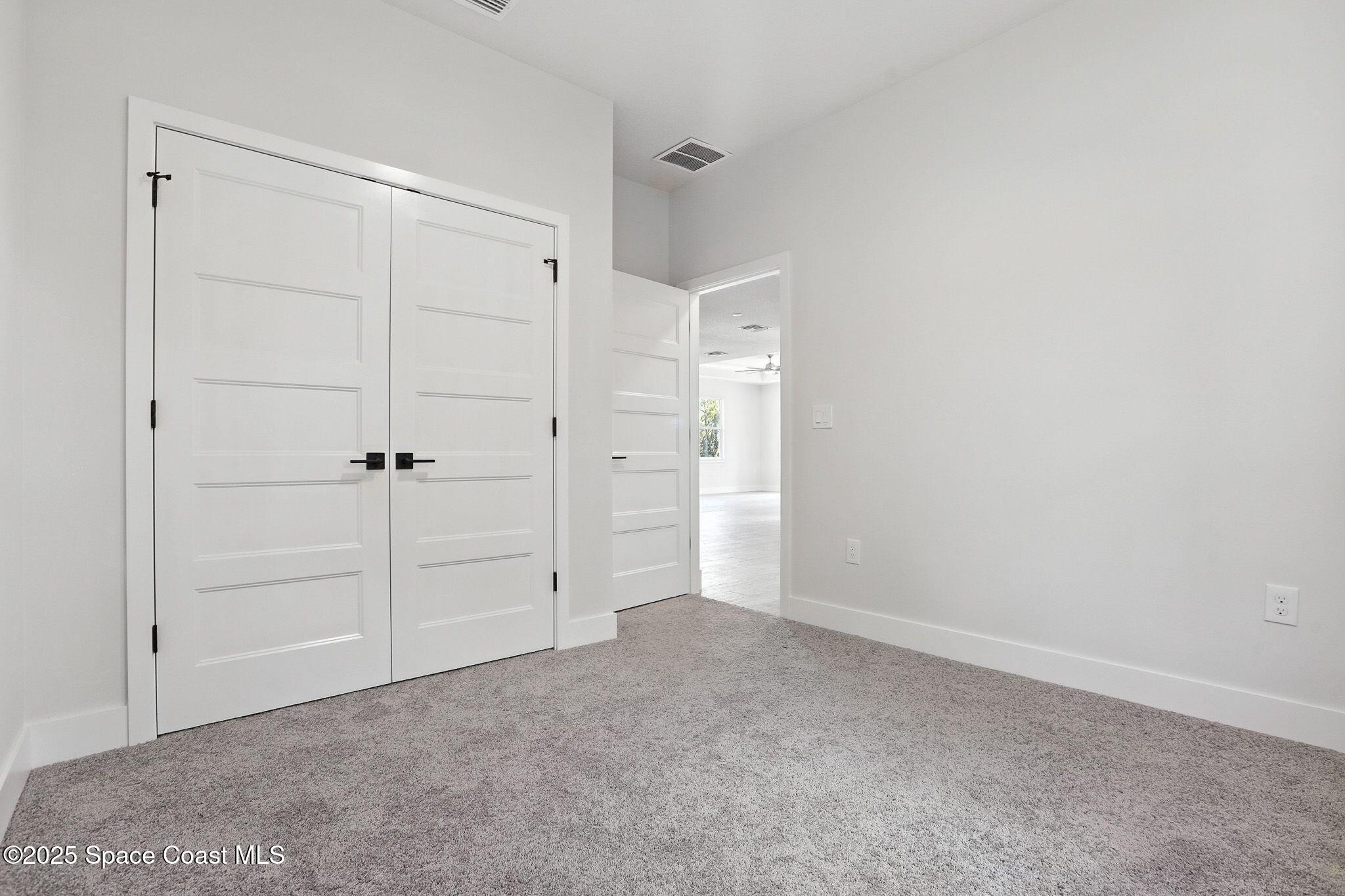 475 Flagler Road Southeast Palm Bay, FL 32909 - Photo 19 of 30 a view of an empty room