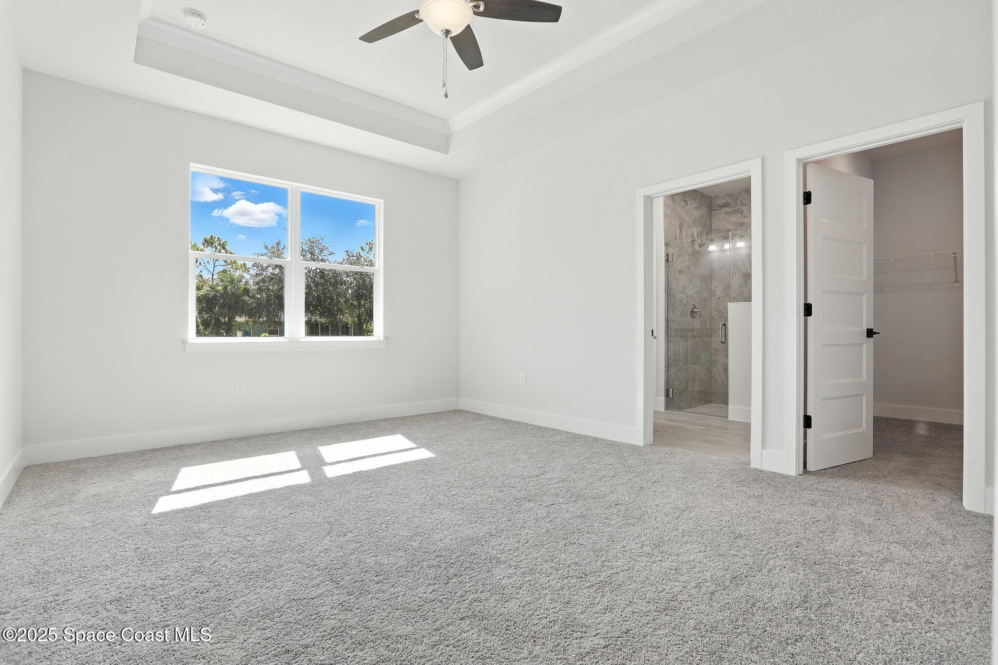 475 Flagler Road Southeast Palm Bay, FL 32909 - Photo 23 of 30 a view of an empty room with a window