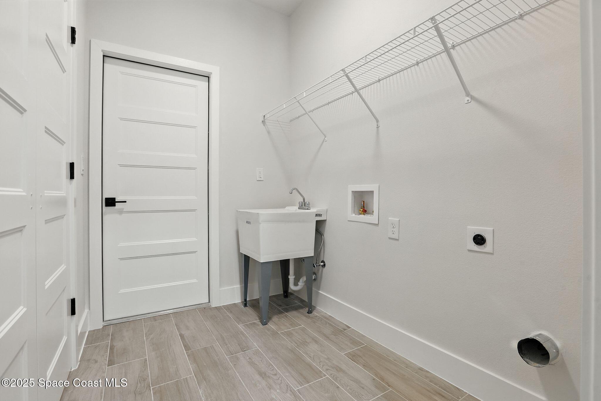 475 Flagler Road Southeast Palm Bay, FL 32909 - Photo 24 of 30 a view of a walk in closet