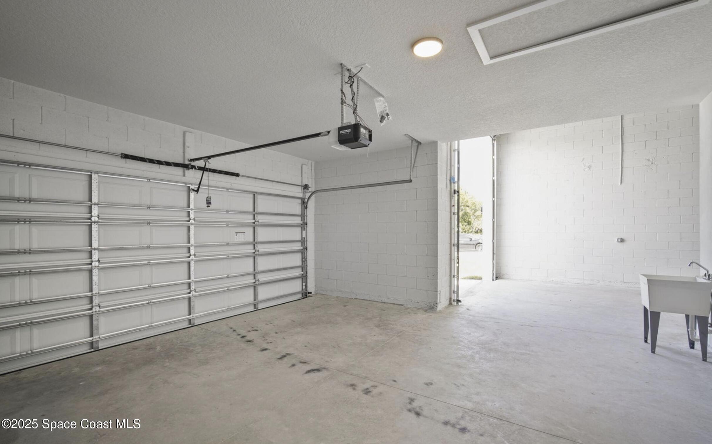 475 Flagler Road Southeast Palm Bay, FL 32909 - Photo 25 of 30 a view of a garage