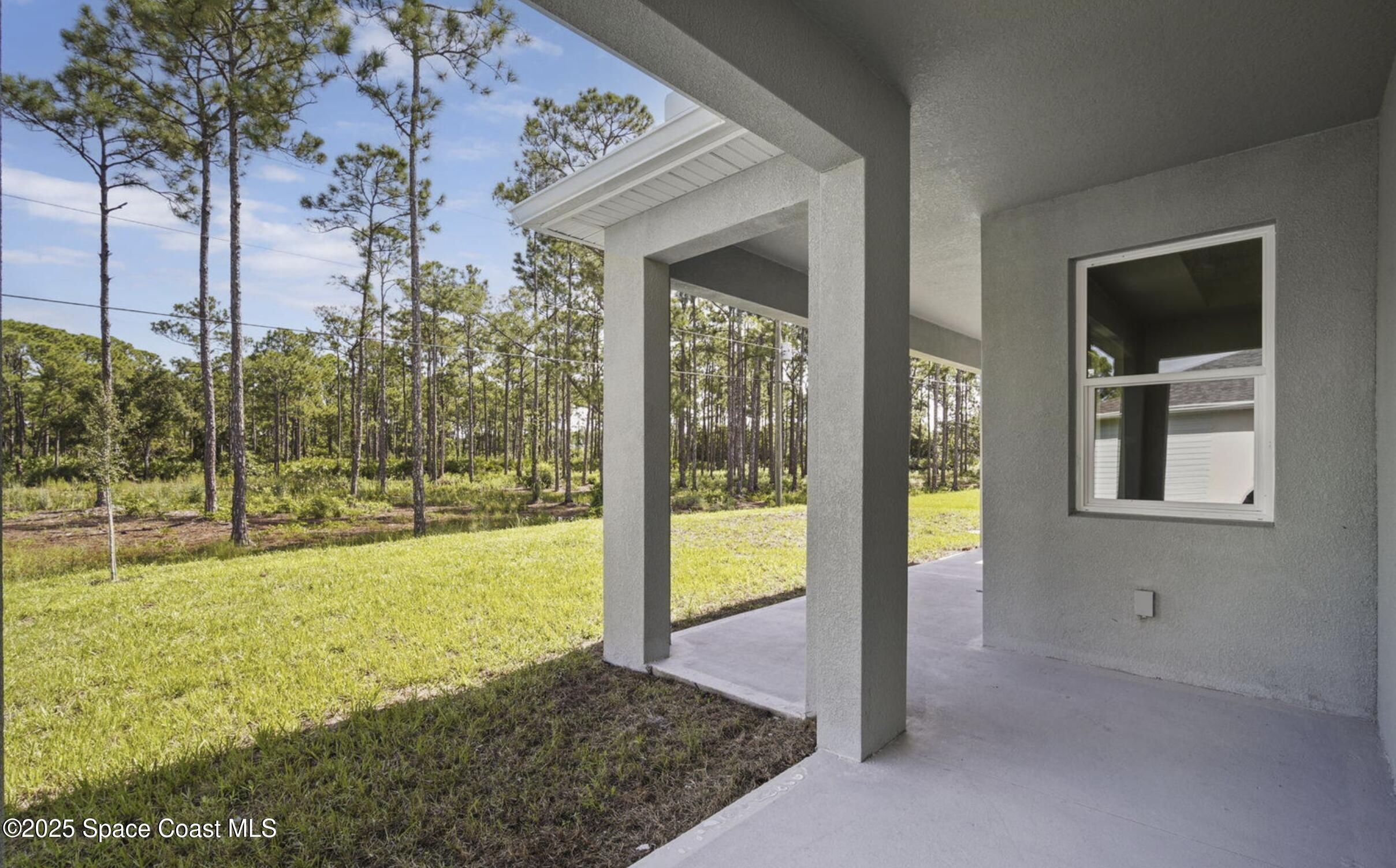 475 Flagler Road Southeast Palm Bay, FL 32909 - Photo 28 of 30 a view of an empty room and window