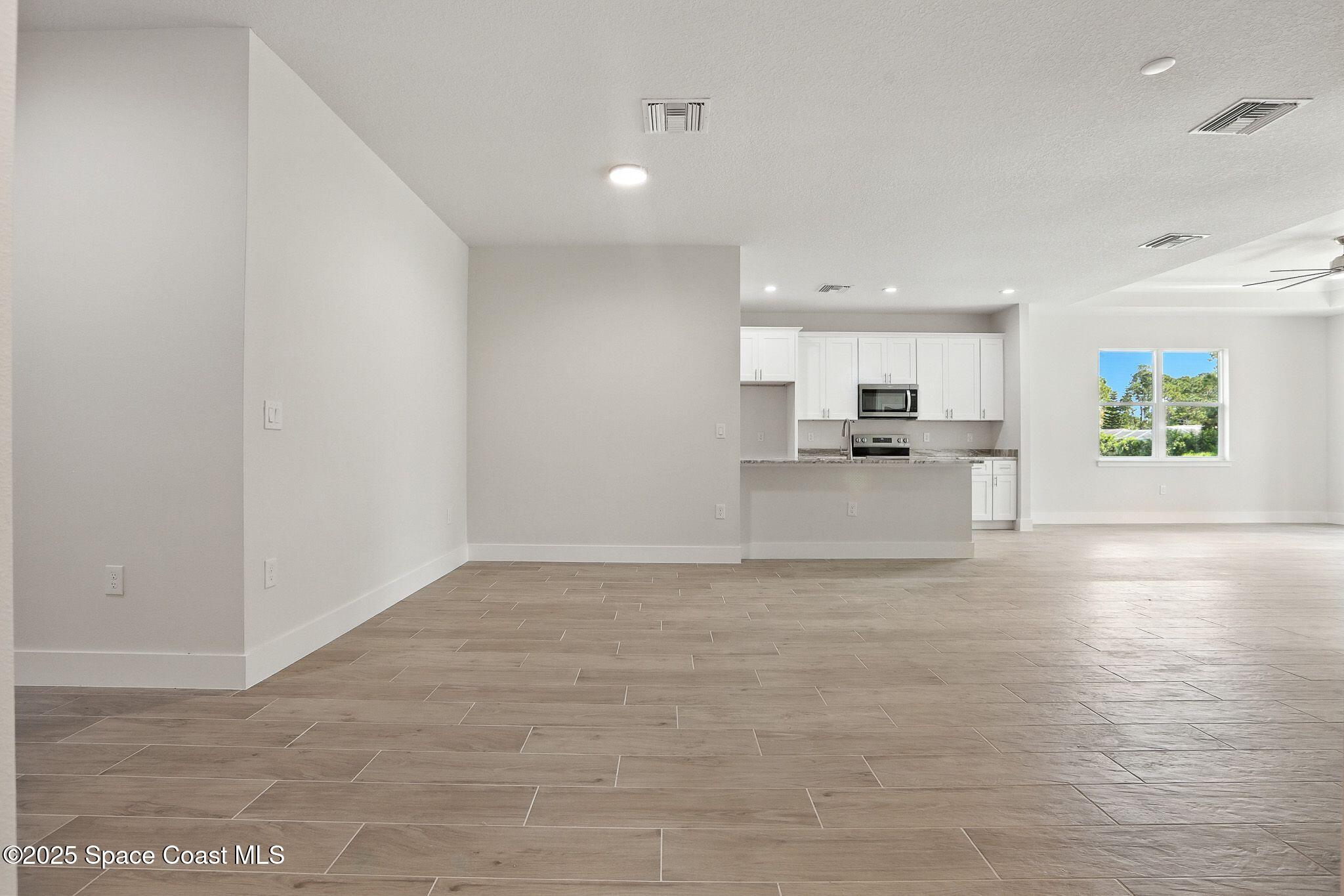 475 Flagler Road Southeast Palm Bay, FL 32909 - Photo 8 of 30 a view of a kitchen with a sink