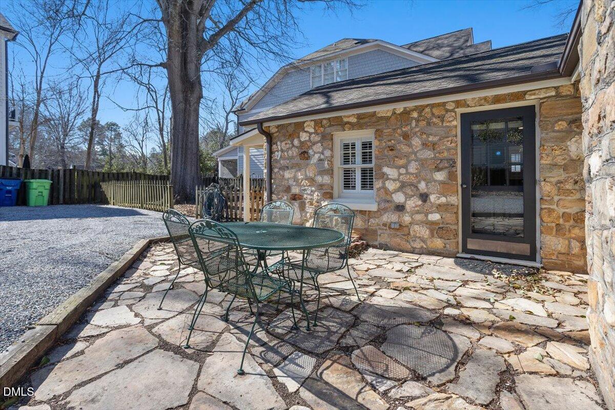 2609 Davis Street Raleigh, NC 27608 - Photo 5 of 31 Flat stone patio for outdoor leisure.