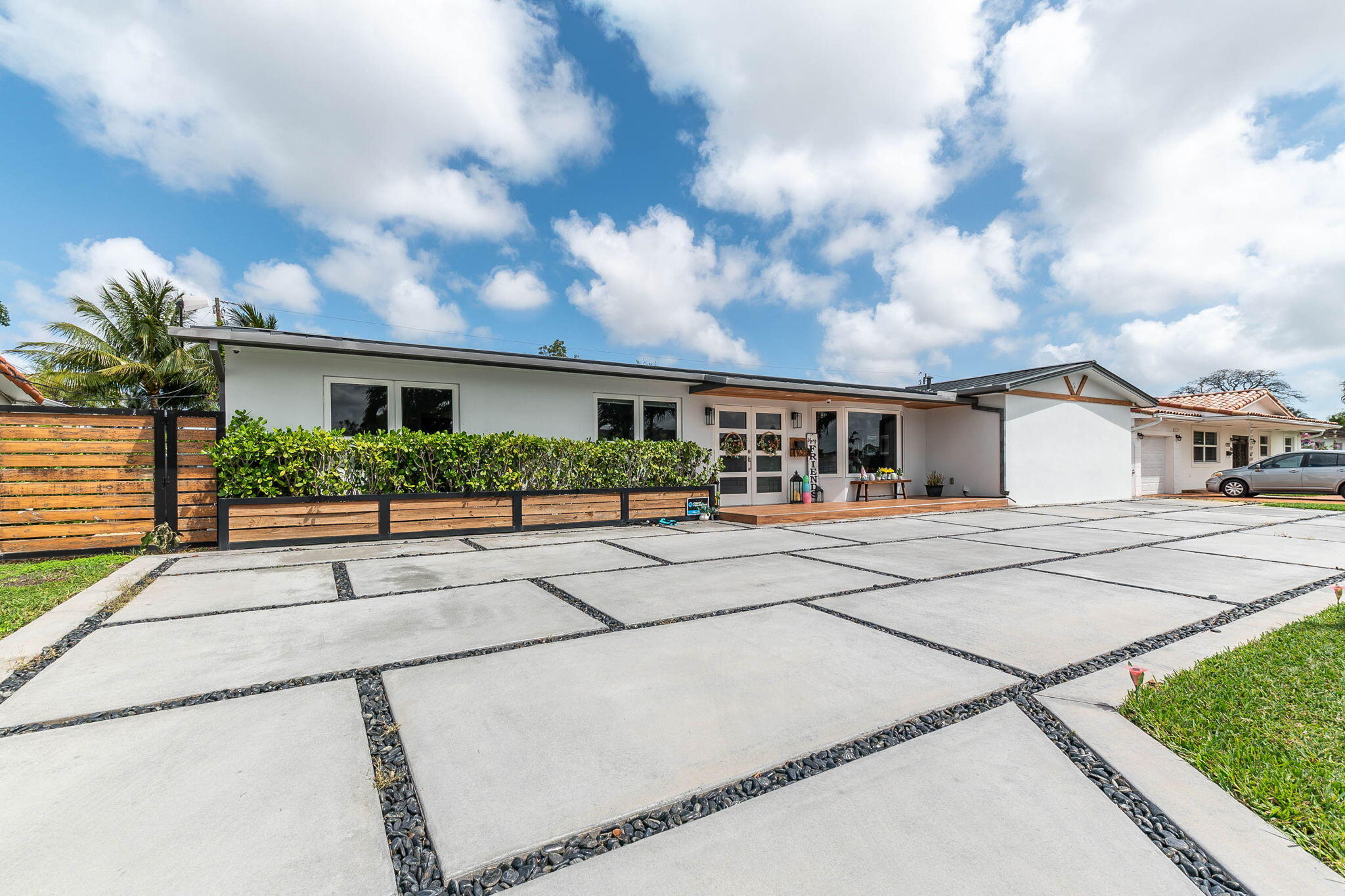 a front view of house with garage and yard