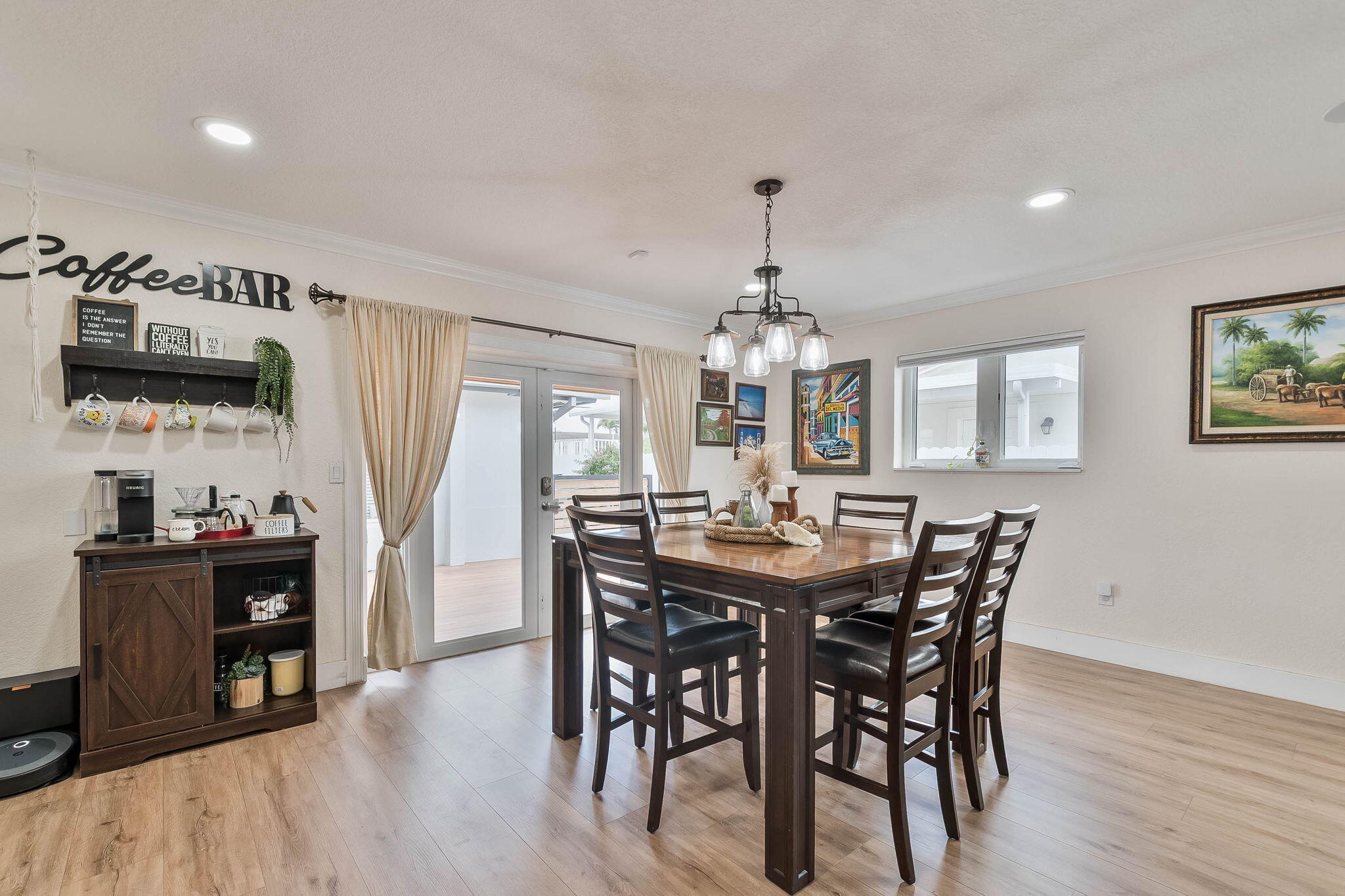 6231 Southwest 94th Avenue Miami, FL 33173 - Photo 12 of 47 a view of a dining room with furniture window and wooden floor