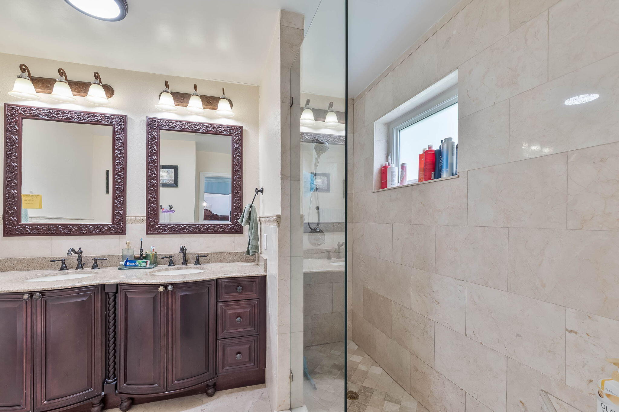 6231 Southwest 94th Avenue Miami, FL 33173 - Photo 23 of 47 a bathroom with a sink and a mirror