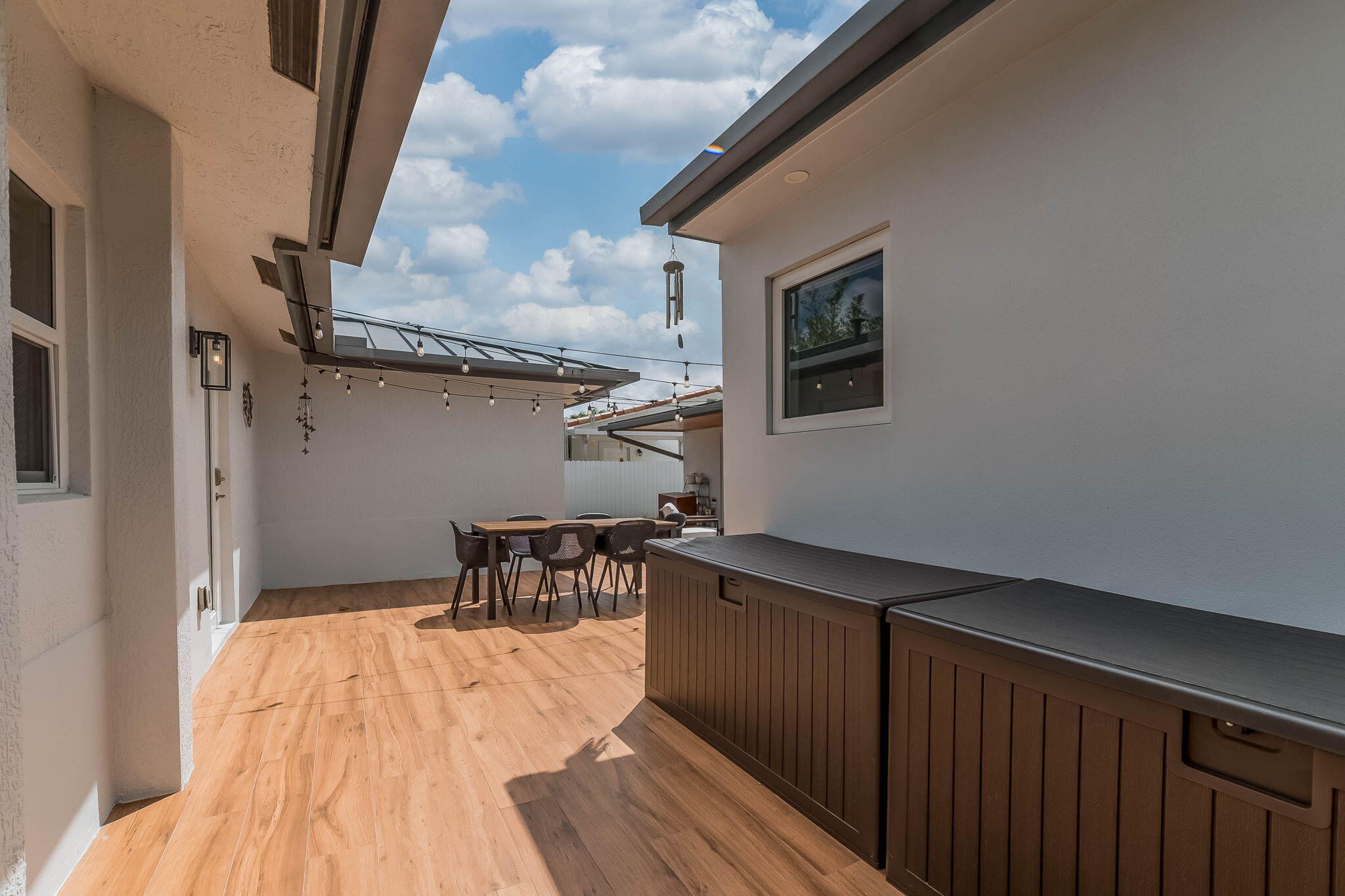 6231 Southwest 94th Avenue Miami, FL 33173 - Photo 30 of 47 a room with wooden floor and furniture