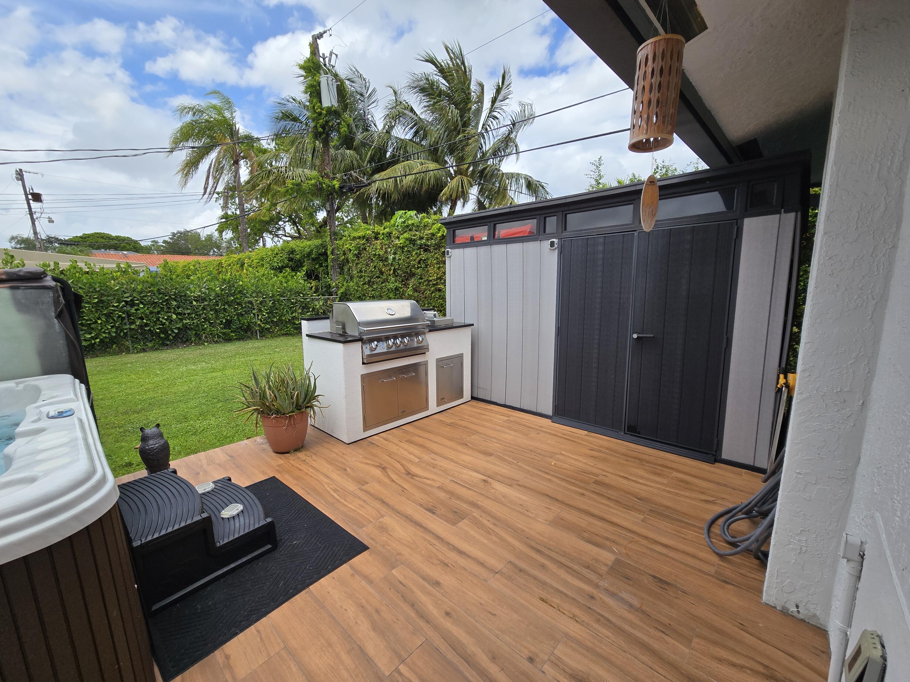 6231 Southwest 94th Avenue Miami, FL 33173 - Photo 32 of 47 a view of a house with backyard and a patio