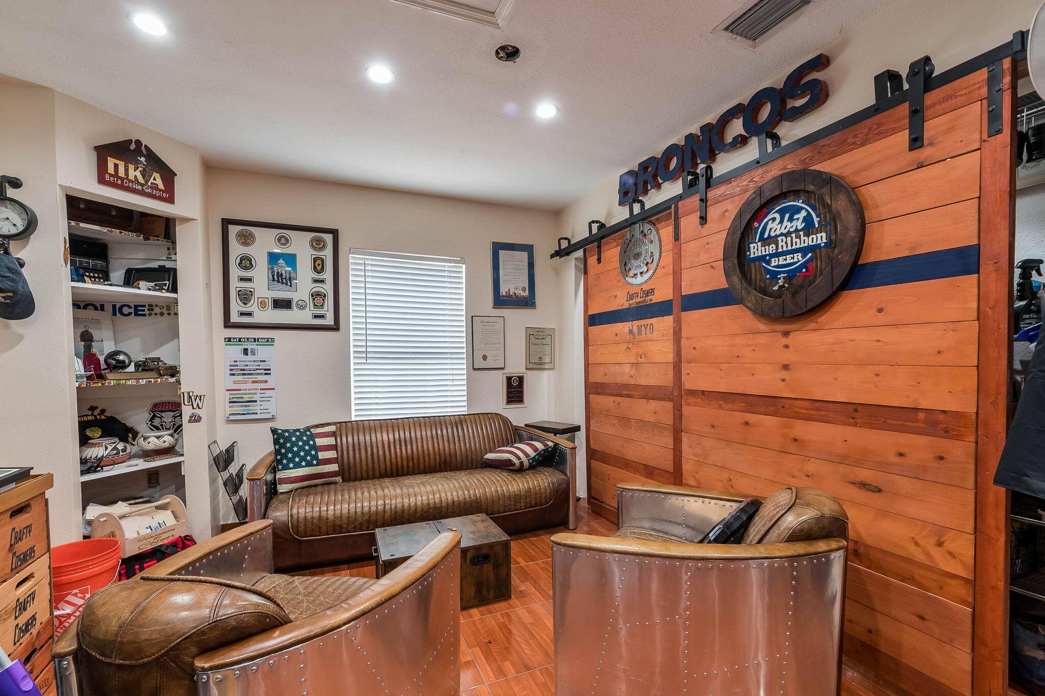 6231 Southwest 94th Avenue Miami, FL 33173 - Photo 36 of 47 a living room with furniture a rug and a wall