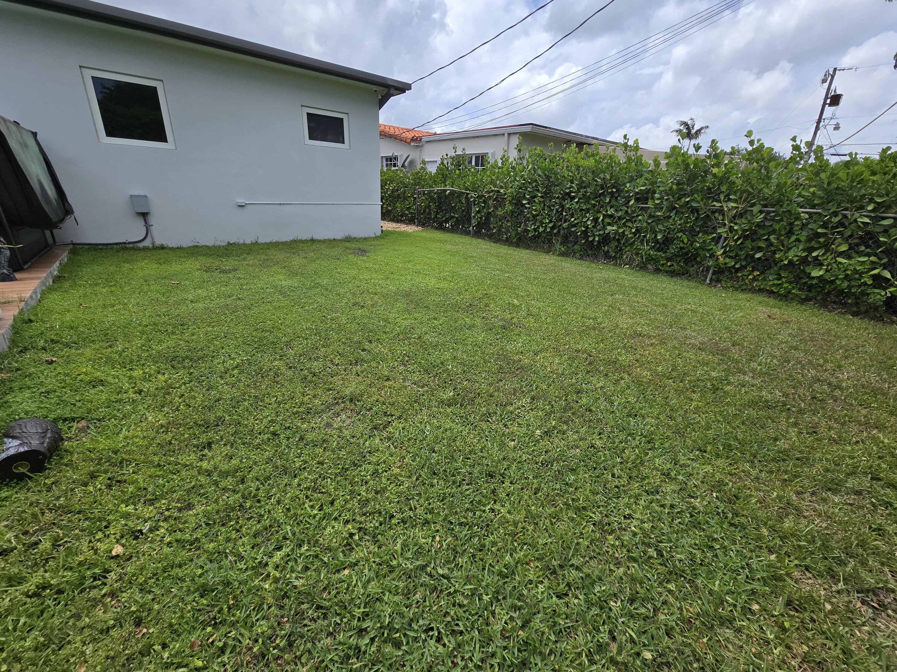 6231 Southwest 94th Avenue Miami, FL 33173 - Photo 38 of 47 a view of a backyard with potted plants