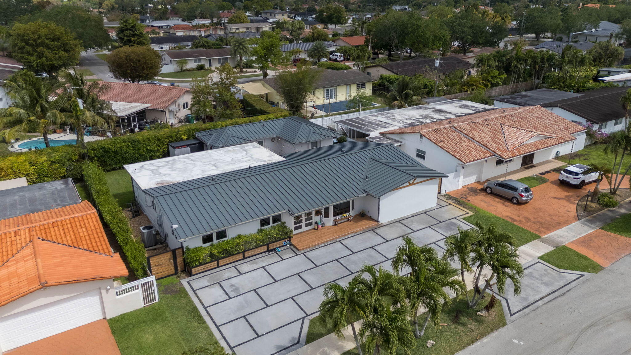 6231 Southwest 94th Avenue Miami, FL 33173 - Photo 42 of 47 an aerial view of a house with a garden and mountain view in back