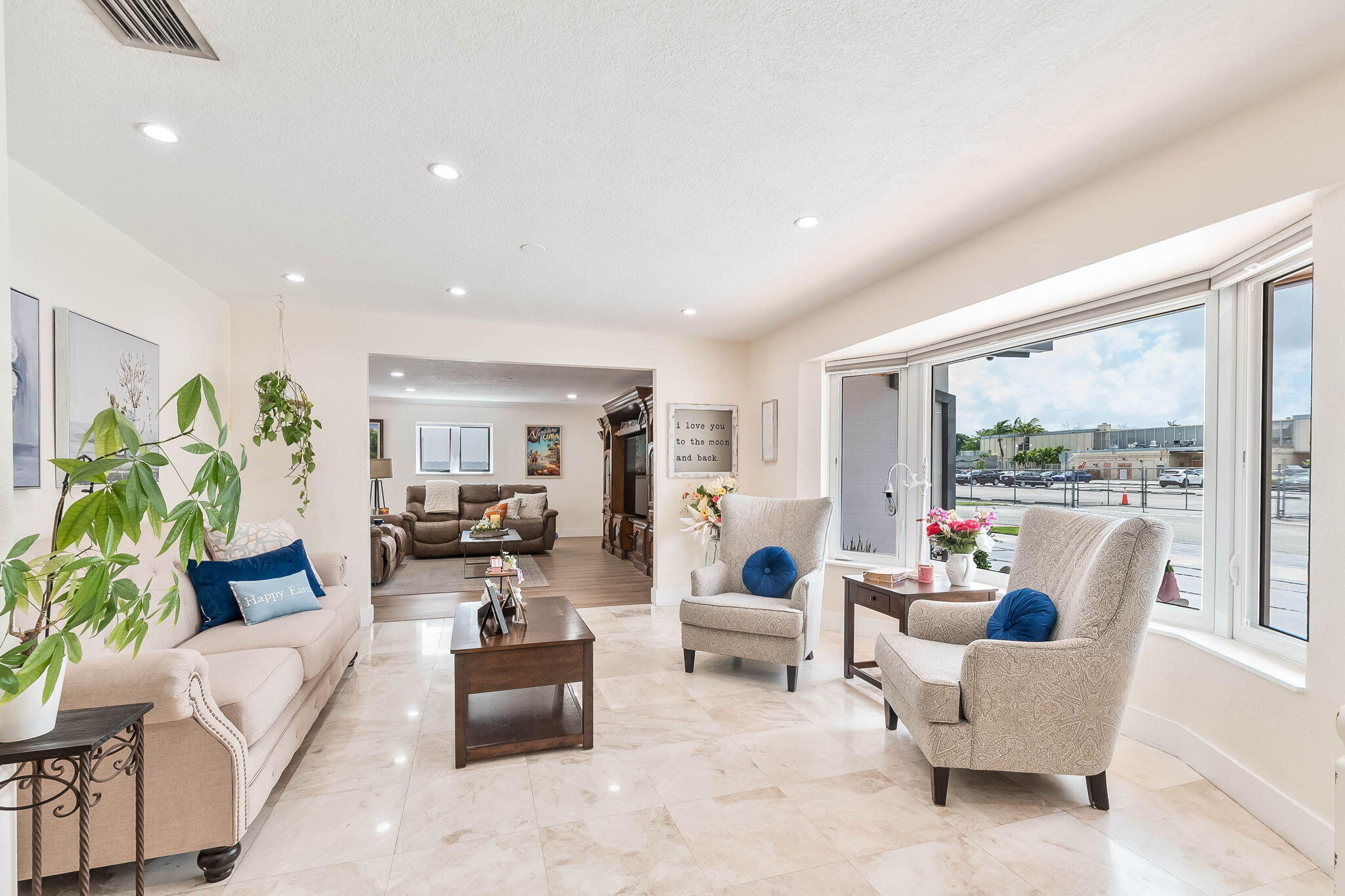 6231 Southwest 94th Avenue Miami, FL 33173 - Photo 7 of 47 a living room with furniture and a large window