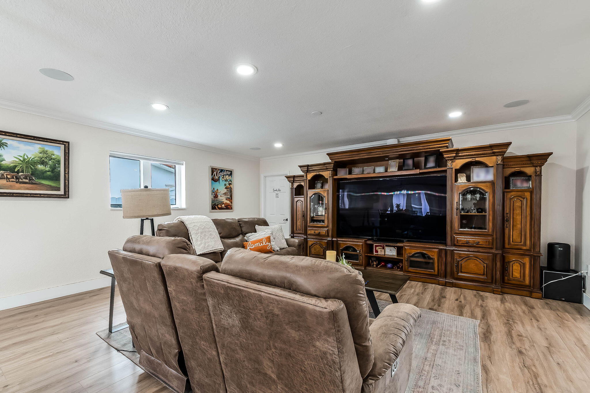 6231 Southwest 94th Avenue Miami, FL 33173 - Photo 10 of 47 a living room with furniture and a flat screen tv