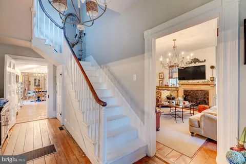 a bedroom with a bed and a fireplace