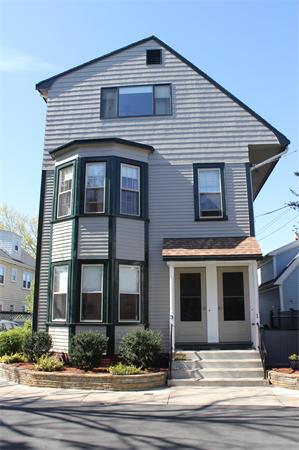 1-3 Rockingham Place Cambridge, MA 02139 - Photo 19 of 23 a front view of a house