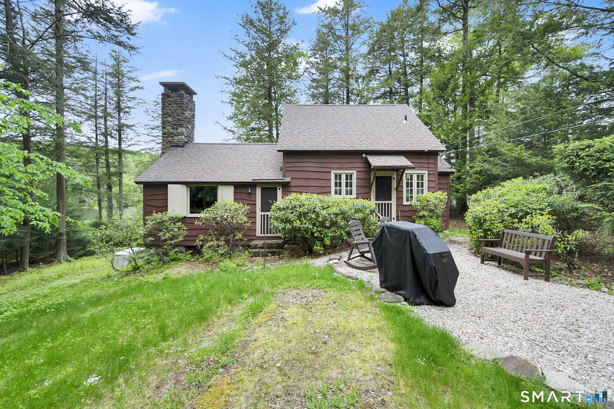 47 Pinehurst Road Hartland, CT 06091 - Photo 33 of 39 a front view of a house with yard and green space
