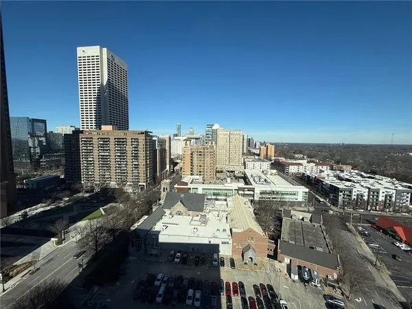 a view of city with tall buildings